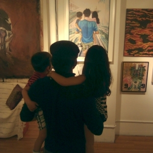 Artist, his kids, and his work.